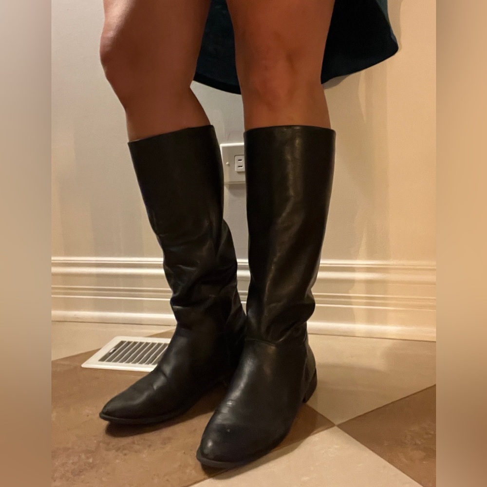 Black leather knee high boots